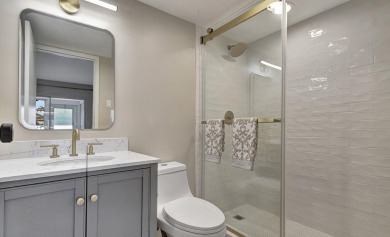 Enjoy serene water views from this fully remodeled ground-floor on Kings Point Golf - Executive in Florida - for sale on GolfHomes.com, golf home, golf lot