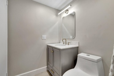 Enjoy serene water views from this fully remodeled ground-floor on Kings Point Golf - Executive in Florida - for sale on GolfHomes.com, golf home, golf lot