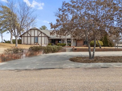 Welcome to INDIAN HILLS! Golfers - this exquisite tudor style on Sunset Hills Golf Course in Oklahoma - for sale on GolfHomes.com, golf home, golf lot