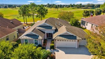 BOND PAID!! Lovely Expanded 3 bedroom 2 bath Lantana with tandem on Bacall Executive Golf Course in Florida - for sale on GolfHomes.com, golf home, golf lot