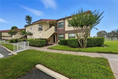 Behind the gates of Ventura Country Club, this first-floor on Ventura Country Club in Florida - for sale on GolfHomes.com, golf home, golf lot
