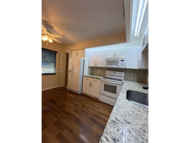 Welcome home to this stunning 2-bedroom, 2-bathroom FIRST FLOOR on Flamingo Lakes Country Club in Florida - for sale on GolfHomes.com, golf home, golf lot