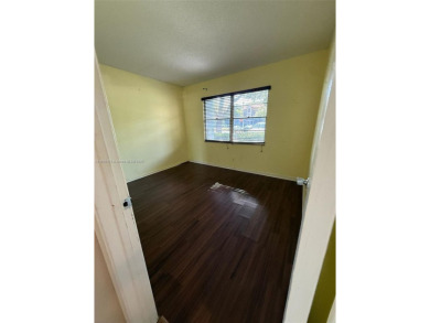 Welcome home to this stunning 2-bedroom, 2-bathroom FIRST FLOOR on Flamingo Lakes Country Club in Florida - for sale on GolfHomes.com, golf home, golf lot