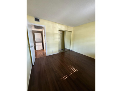 Welcome home to this stunning 2-bedroom, 2-bathroom FIRST FLOOR on Flamingo Lakes Country Club in Florida - for sale on GolfHomes.com, golf home, golf lot