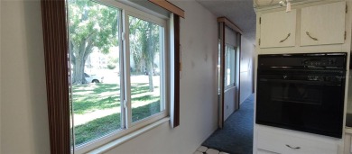 Welcome home to your oversized 2/2 partially furnished OUTSIDE on On Top Of The World Golf Course in Florida - for sale on GolfHomes.com, golf home, golf lot