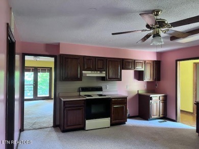 Welcome to resort-style living in the heart of Tellico Village! on Toqua Golf Course - Loudon County in Tennessee - for sale on GolfHomes.com, golf home, golf lot