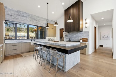 Perched on a private, sweeping 180-degree view lot on the on Red Ledges Golf Club in Utah - for sale on GolfHomes.com, golf home, golf lot