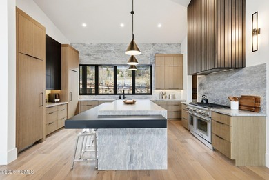 Perched on a private, sweeping 180-degree view lot on the on Red Ledges Golf Club in Utah - for sale on GolfHomes.com, golf home, golf lot