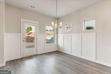 Beautiful Ranch-Style Home in the Tranquil Golf Course Community on Traditions of Braselton Golf Club in Georgia - for sale on GolfHomes.com, golf home, golf lot