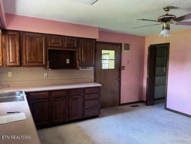 Welcome to resort-style living in the heart of Tellico Village! on Toqua Golf Course - Loudon County in Tennessee - for sale on GolfHomes.com, golf home, golf lot