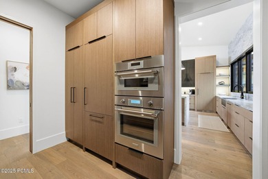 Perched on a private, sweeping 180-degree view lot on the on Red Ledges Golf Club in Utah - for sale on GolfHomes.com, golf home, golf lot