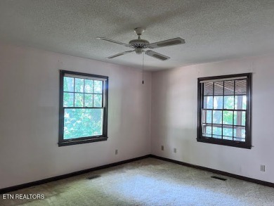 Welcome to resort-style living in the heart of Tellico Village! on Toqua Golf Course - Loudon County in Tennessee - for sale on GolfHomes.com, golf home, golf lot