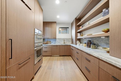 Perched on a private, sweeping 180-degree view lot on the on Red Ledges Golf Club in Utah - for sale on GolfHomes.com, golf home, golf lot