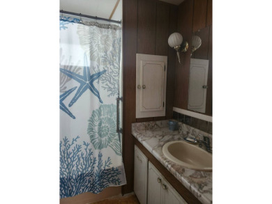 Welcome to your new home in the beautiful 55+ Woodall's Village on Lone Palm Golf Club in Florida - for sale on GolfHomes.com, golf home, golf lot