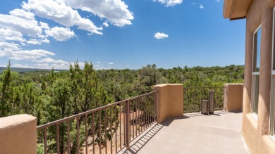 Stunning modern pueblo style home with surrounding mountain on Paa-Ko Ridge Golf Club  in New Mexico - for sale on GolfHomes.com, golf home, golf lot