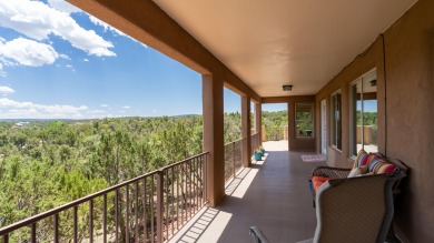 Stunning modern pueblo style home with surrounding mountain on Paa-Ko Ridge Golf Club  in New Mexico - for sale on GolfHomes.com, golf home, golf lot