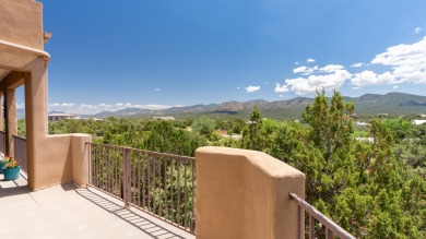 Stunning modern pueblo style home with surrounding mountain on Paa-Ko Ridge Golf Club  in New Mexico - for sale on GolfHomes.com, golf home, golf lot