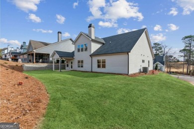 Beautiful Ranch-Style Home in the Tranquil Golf Course Community on Traditions of Braselton Golf Club in Georgia - for sale on GolfHomes.com, golf home, golf lot