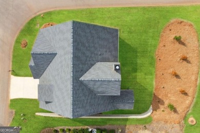 Beautiful Ranch-Style Home in the Tranquil Golf Course Community on Traditions of Braselton Golf Club in Georgia - for sale on GolfHomes.com, golf home, golf lot