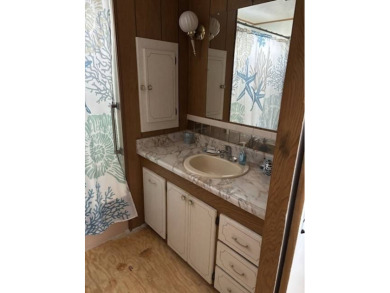 Welcome to your new home in the beautiful 55+ Woodall's Village on Lone Palm Golf Club in Florida - for sale on GolfHomes.com, golf home, golf lot