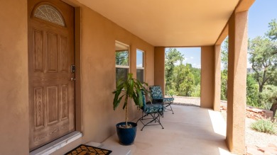 Stunning modern pueblo style home with surrounding mountain on Paa-Ko Ridge Golf Club  in New Mexico - for sale on GolfHomes.com, golf home, golf lot