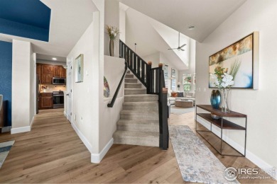 This stunning corner townhome backs to green space and offers a on Pelican Lakes Golf and Country Club in Colorado - for sale on GolfHomes.com, golf home, golf lot