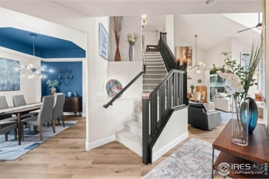 This stunning corner townhome backs to green space and offers a on Pelican Lakes Golf and Country Club in Colorado - for sale on GolfHomes.com, golf home, golf lot