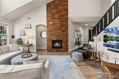 This stunning corner townhome backs to green space and offers a on Pelican Lakes Golf and Country Club in Colorado - for sale on GolfHomes.com, golf home, golf lot