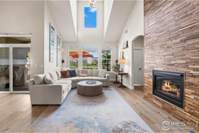 This stunning corner townhome backs to green space and offers a on Pelican Lakes Golf and Country Club in Colorado - for sale on GolfHomes.com, golf home, golf lot