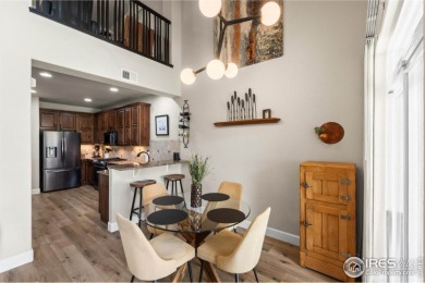 This stunning corner townhome backs to green space and offers a on Pelican Lakes Golf and Country Club in Colorado - for sale on GolfHomes.com, golf home, golf lot