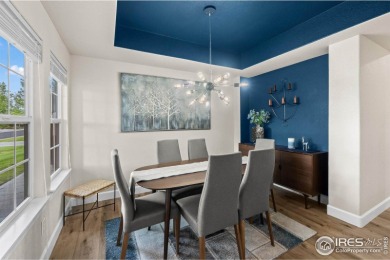 This stunning corner townhome backs to green space and offers a on Pelican Lakes Golf and Country Club in Colorado - for sale on GolfHomes.com, golf home, golf lot