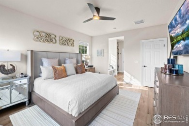 This stunning corner townhome backs to green space and offers a on Pelican Lakes Golf and Country Club in Colorado - for sale on GolfHomes.com, golf home, golf lot