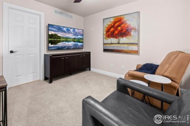 This stunning corner townhome backs to green space and offers a on Pelican Lakes Golf and Country Club in Colorado - for sale on GolfHomes.com, golf home, golf lot