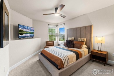This stunning corner townhome backs to green space and offers a on Pelican Lakes Golf and Country Club in Colorado - for sale on GolfHomes.com, golf home, golf lot