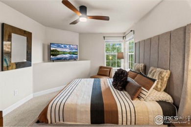 This stunning corner townhome backs to green space and offers a on Pelican Lakes Golf and Country Club in Colorado - for sale on GolfHomes.com, golf home, golf lot