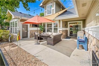 This stunning corner townhome backs to green space and offers a on Pelican Lakes Golf and Country Club in Colorado - for sale on GolfHomes.com, golf home, golf lot