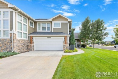 This stunning corner townhome backs to green space and offers a on Pelican Lakes Golf and Country Club in Colorado - for sale on GolfHomes.com, golf home, golf lot