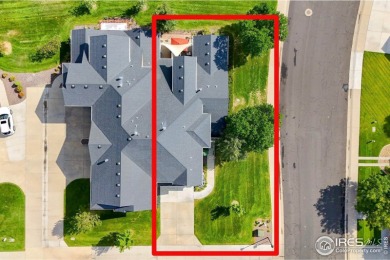 This stunning corner townhome backs to green space and offers a on Pelican Lakes Golf and Country Club in Colorado - for sale on GolfHomes.com, golf home, golf lot