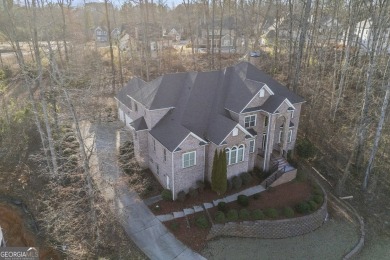 Experience unparalleled elegance in this immaculate custom-built on Traditions of Braselton Golf Club in Georgia - for sale on GolfHomes.com, golf home, golf lot