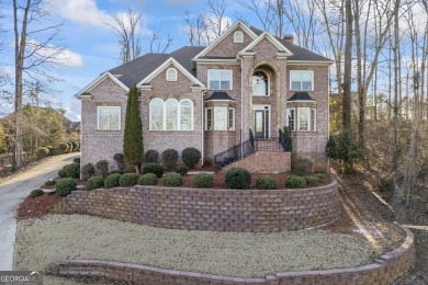 Experience unparalleled elegance in this immaculate custom-built on Traditions of Braselton Golf Club in Georgia - for sale on GolfHomes.com, golf home, golf lot