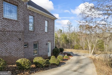 Experience unparalleled elegance in this immaculate custom-built on Traditions of Braselton Golf Club in Georgia - for sale on GolfHomes.com, golf home, golf lot