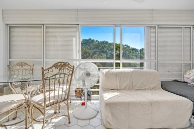 Updated and furnished 2 bed/2 bath unit. Open kitchen, shaker on Wynmoor Golf Course in Florida - for sale on GolfHomes.com, golf home, golf lot