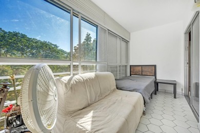 Updated and furnished 2 bed/2 bath unit. Open kitchen, shaker on Wynmoor Golf Course in Florida - for sale on GolfHomes.com, golf home, golf lot