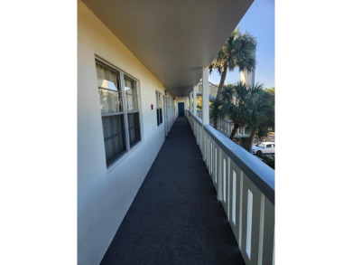 Updated and furnished 2 bed/2 bath unit. Open kitchen, shaker on Wynmoor Golf Course in Florida - for sale on GolfHomes.com, golf home, golf lot