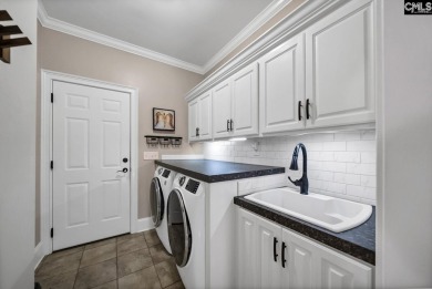 Welcome to this stunning all-brick home offering flexible living on Timberlake Country Club in South Carolina - for sale on GolfHomes.com, golf home, golf lot