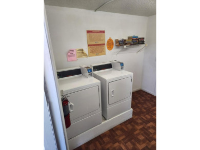 Updated and furnished 2 bed/2 bath unit. Open kitchen, shaker on Wynmoor Golf Course in Florida - for sale on GolfHomes.com, golf home, golf lot