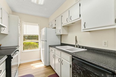 Enoy low-maintenance living with stunning views of Desoto golf on DeSoto Golf Course in Arkansas - for sale on GolfHomes.com, golf home, golf lot