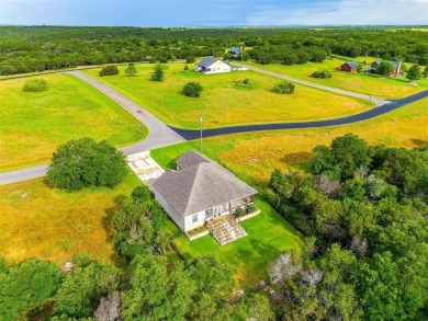 This custom home is ready for new owners to love, move in ready on The Retreat in Texas - for sale on GolfHomes.com, golf home, golf lot