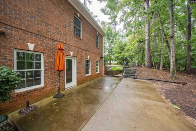 Welcome to this stunning all-brick home offering flexible living on Timberlake Country Club in South Carolina - for sale on GolfHomes.com, golf home, golf lot