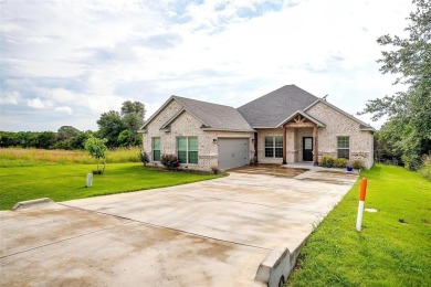 This custom home is ready for new owners to love, move in ready on The Retreat in Texas - for sale on GolfHomes.com, golf home, golf lot